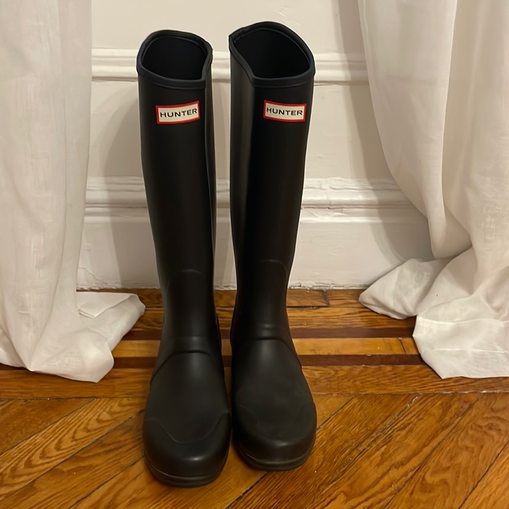 Black tall hunter boots